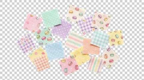 Fabric swatches printed with macaron patterns in pastel tones. Stock Photos