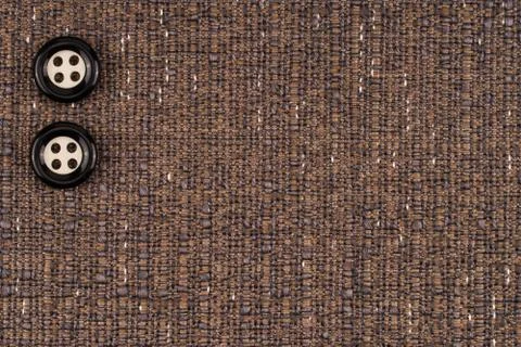 Fabric texture with buttons. Abstract background, empty template. Stock Photos