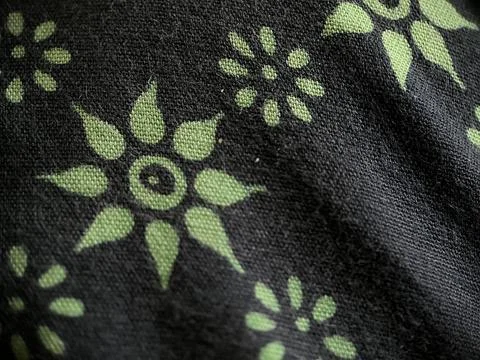 Fabric texture with green flower pattern Stock Photos