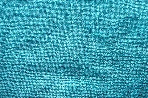 The fabric texture is made of blue microfiber. Close-up Stock Photos