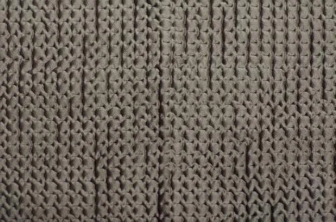 Fabric texture with a three-dimensional textured pattern. Gray soft microfibe Stock Photos