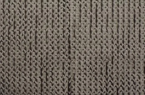 Fabric texture with a three-dimensional textured pattern. Gray soft microf... Stock Photos