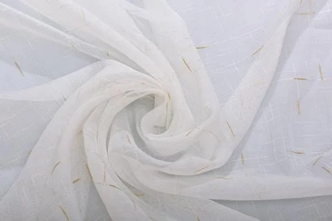 The fabric is white, rolled up by the inversion of the waves. Stock Photos