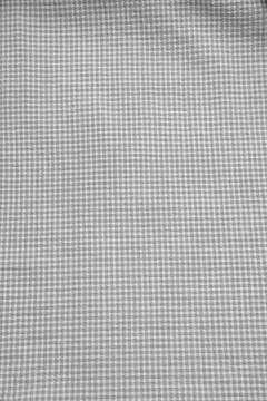 Fabric.Checkered fabric. Checkered pattern. Material for clothing. The text.. Stock Photos