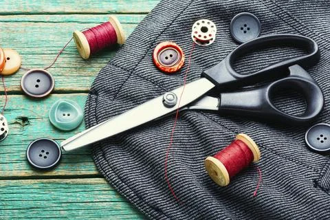 Fabrics and sewing tools Stock Photos