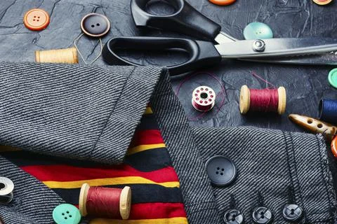 Fabrics and sewing tools Stock Photos