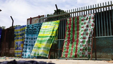 Fabrics dyed with batik techniques Stock Footage 304846522