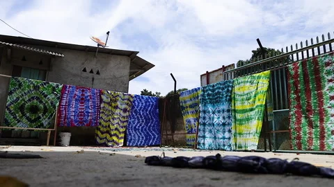 Fabrics dyed with batik techniques Stock Footage 304846527