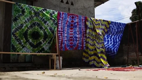 Fabrics dyed with batik techniques Stock Footage 304849190