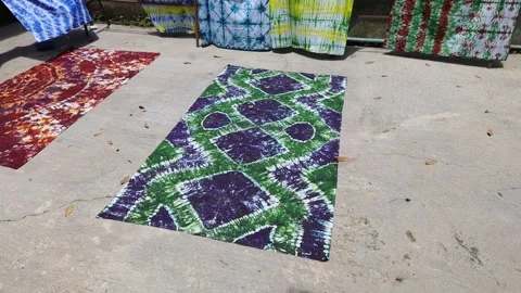 Fabrics dyed with batik techniques Stock Footage 304849192