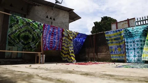 Fabrics dyed with batik techniques Stock Footage 304849194