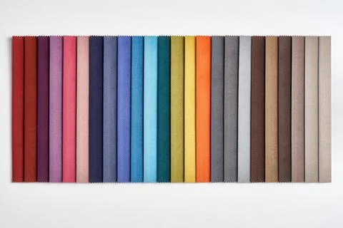 Fabrics samples collection as decorative background in store Stock Photos