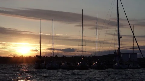 Fabulous warm cloudy evening orange sunset sky over yacht silhouette in river Stock Footage 92800522