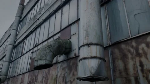 Facade of an abandoned workshop of a large enterprise and large ventilation Stock Footage 149819233