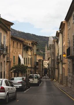 Facade of an ancient building. Background of an old street, Soller, Mallorca. Stock Photos