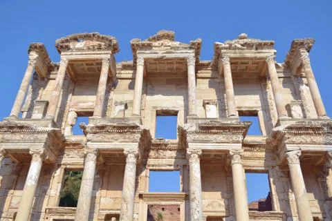 The facade of an ancient building with columns. The Celsus library in Turkey. Stock Photos