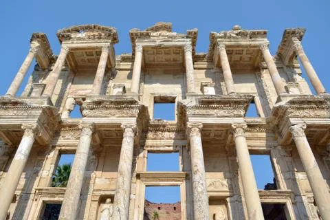 The facade of an ancient building with columns. The Celsus library in Turkey. Stock Photos