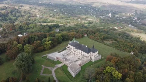Facade and bastion with paved yard of Pidhirtsi castle and fortress from drone Stock Footage 171922849