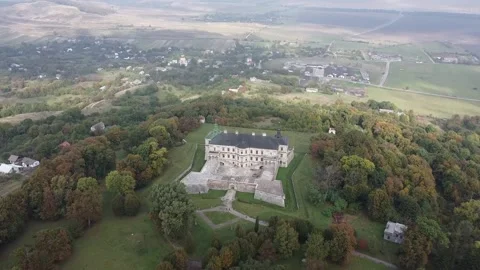 Facade and bastion with paved yard of Pidhirtsi castle and fortress from drone Stock Footage 171923029