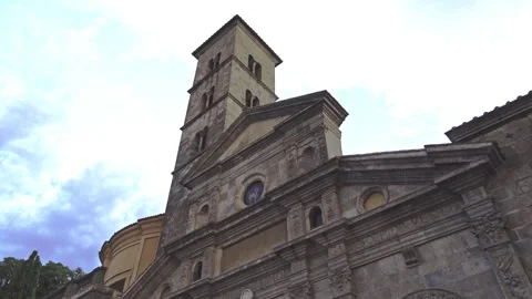 The facade and the bell tower of the Basilica of Santa Caterina in Bolsena Stock Footage 214044449