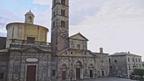The facade and the bell tower of the Basilica of Santa Caterina in Bolsena Stock Footage 214044878