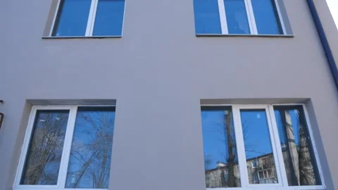 Facade and windows in a newly built house. Stock Footage 296804433