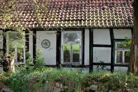 The facade and windows of the old house. Stock Photos
