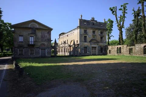 Facade and yard of a mansion Stock Photos