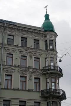 Facade of apartment building with decorative elements Stock Photos