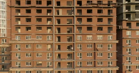Facade of a Apartment Building Under Construction. Building Exterior Video stock 115011459