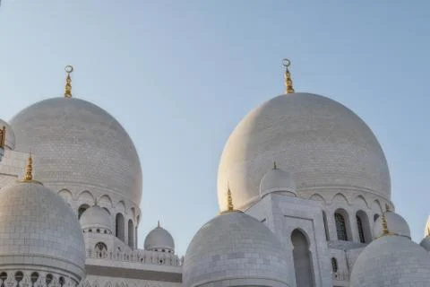 Facade of arabic mosque in Abu Dhabi with sunset light. Great mosque. UAE Stock Photos