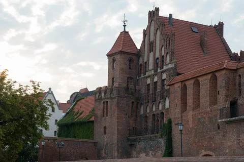 Facade of a beautiful brick building in Torun, Poland Stock Photos