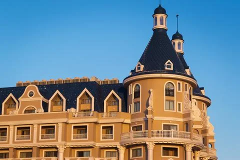 Facade of the beautiful castle with tower Stock Photos