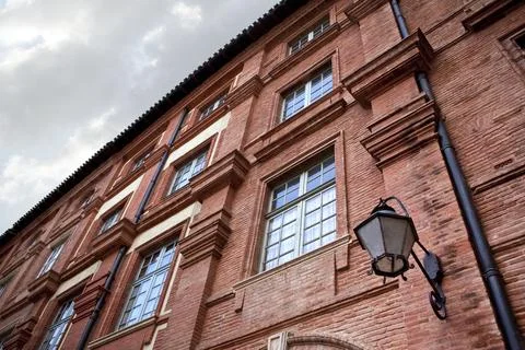 Facade of a brick house Stock Photos