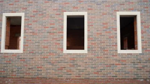 Facade of a brick house. windowless brick building Foto stock