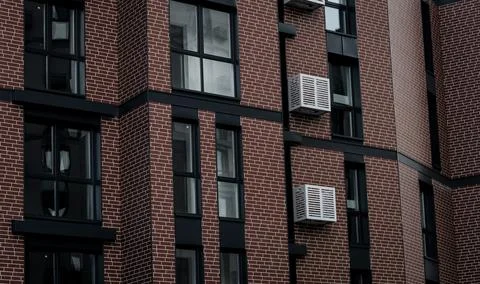 Facade of  brick modern building Stock Photos