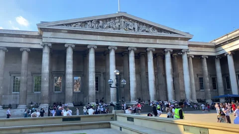 The facade of the British Museum with crowds gathering outside in London Stock Footage 321460255