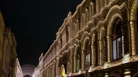 Facade of building covered with small lamps as decorations for New Year. Holiday Stock Footage 150206043