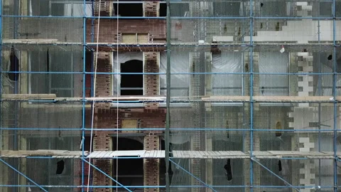 Facade of the building in scaffolding Stock Footage 231797626