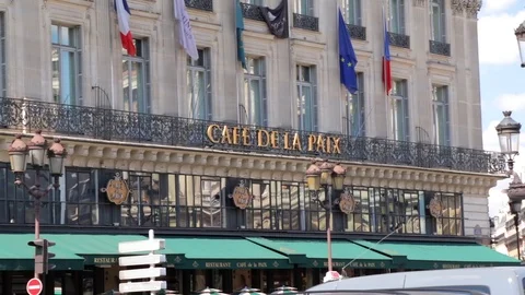 Facade of the Cafe de la Paix near the Opera Garnier in Paris France Stock Footage 105523221