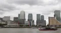 Facade Canary Wharf Skyline Thames River London Panoramic View Tour Boat Passing HD Footage