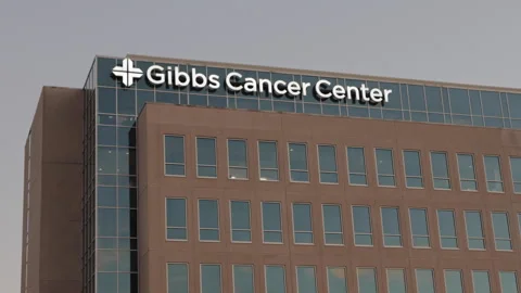 Facade of Cancer Centre Building in Evening Night Time. Cancer Centre Build.. Stock-Footage 321008948