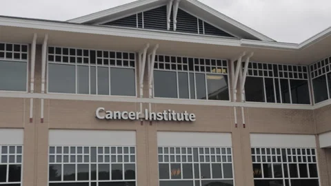 Facade of Cancer Centre Building in Evening Night Time. Cancer Centre Build.. Video stock 336864709
