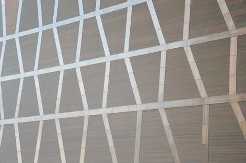 Facade cladding of the building. Decorative brown geometric panels arranged.. Stock Photos