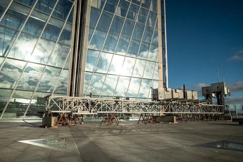 Facade cleaning device for skyscraper glass walls. Automated window washing.. Stock Photos