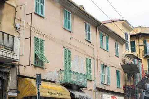 Facade with crumbling plaster. Stock Photos