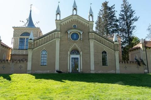 Facade of a Gothic house on a sunny spring day. Stock Photos