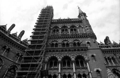 Facade of Gothic style building undergoing renovation and reconstruction Fotos de archivo