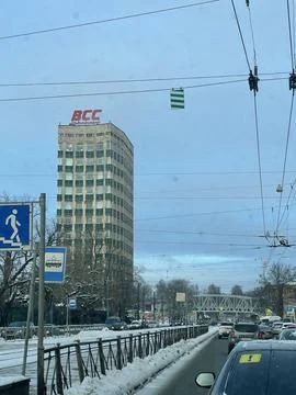 Facade of a grey multi-storey soviet panel building in the fallen snow. Rus.. Stock Photos