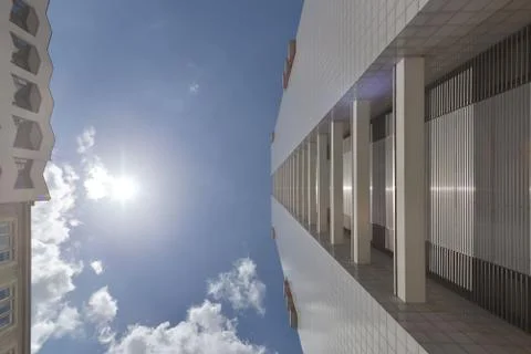 The facade of a high building with some windows closed by blinds Stock Photos